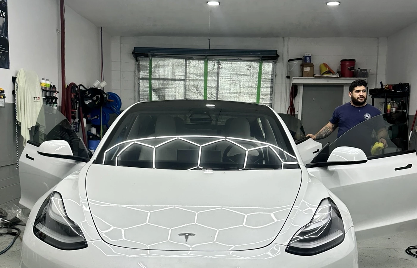 Professional window tint installation at The Car Care Solution in Casselberry Florida